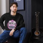 The Merch Shop Organic Sweatshirt - Pink Heritage Crest Logo